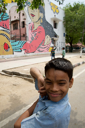 Young Delhi boy, Boy & Lady Aiko's street art. Lodi Colony, Delhi 2015