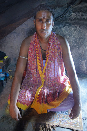 Devotee in Buddha's grotto